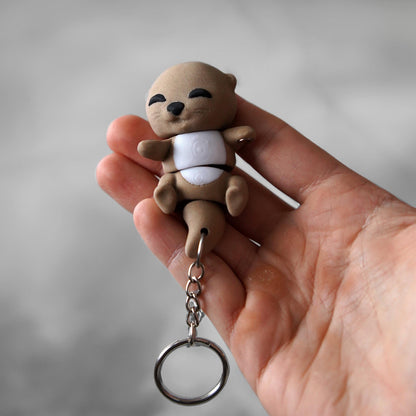 Baby Flexi Otter – Händchenhaltender Otter-Freund